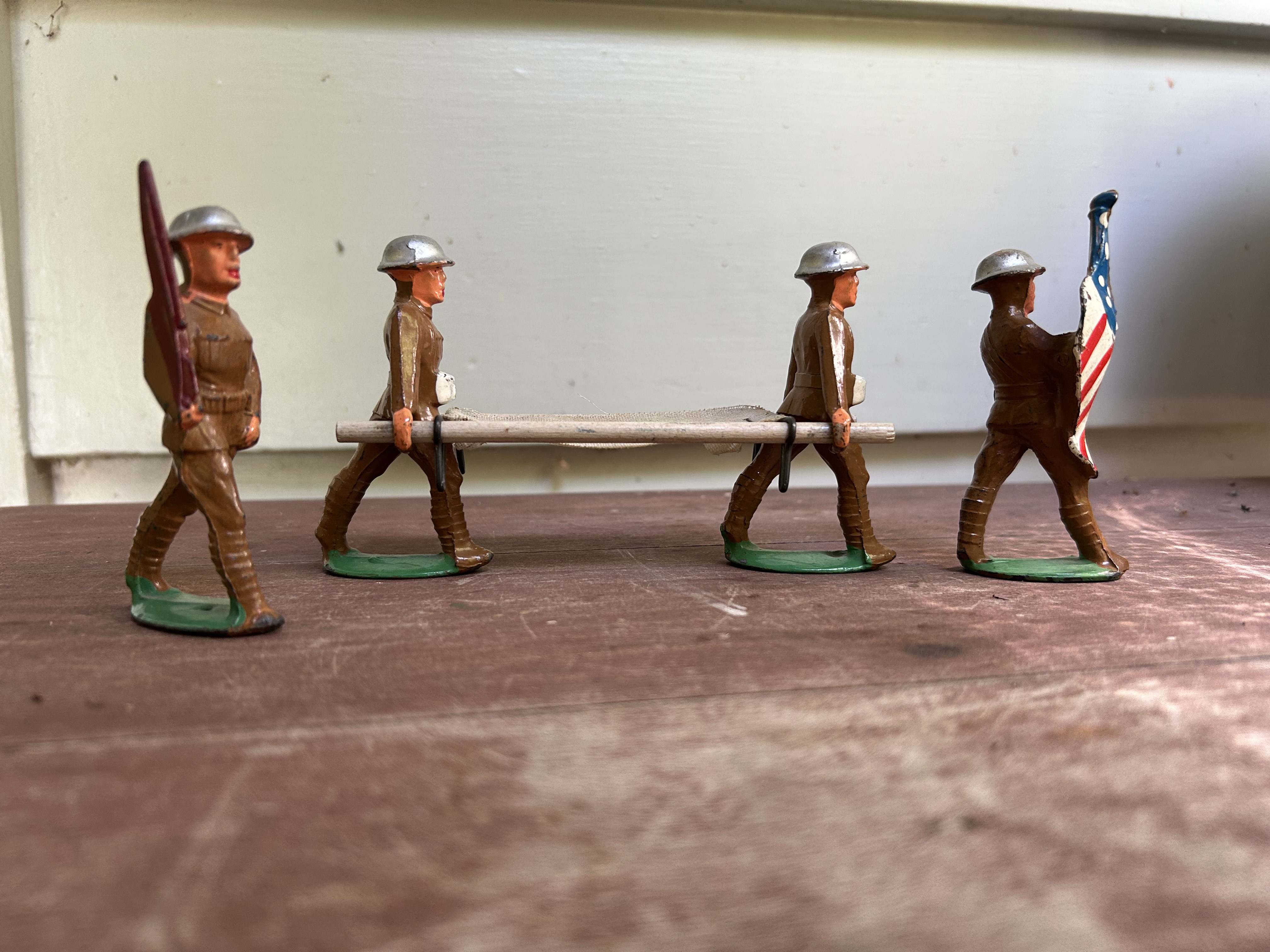 American Interwar Dime-Store Lead Alloy 'Doughboy' Soldiers Group with U.S. Flag and Stretcher (Barclay/Manoil)