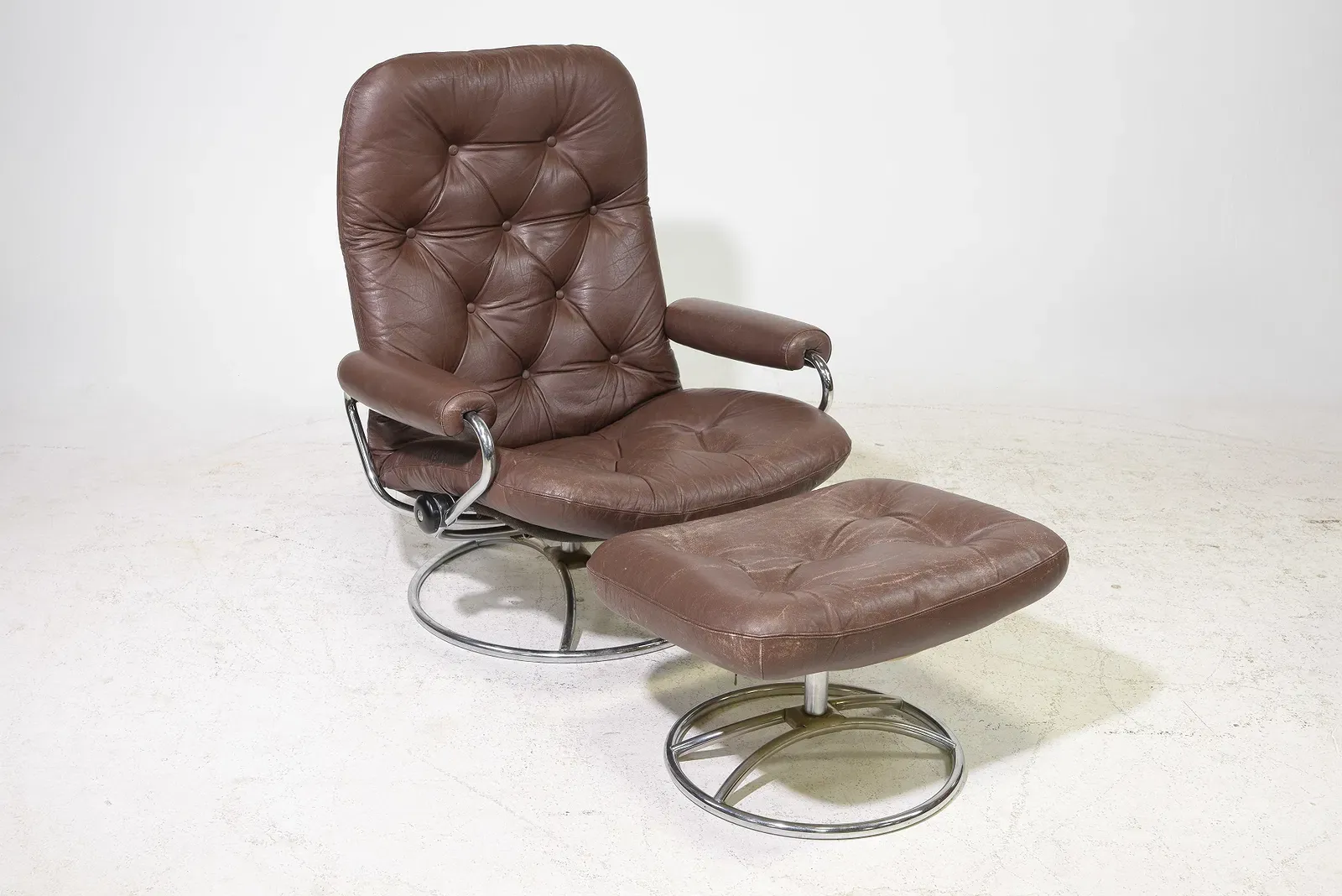 Mid-Century Modern Brown Leather Swivel Lounge Chair and Ottoman