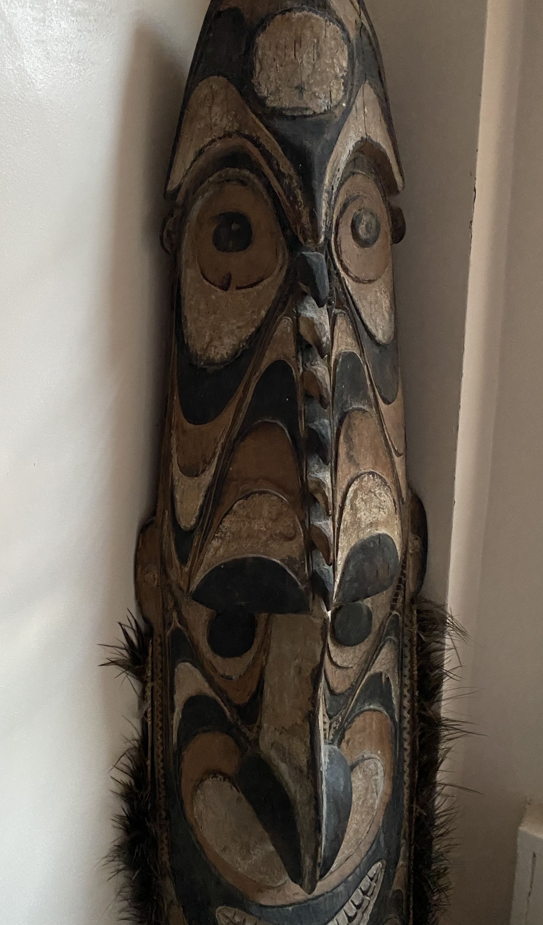 Papua New Guinea Sepik River Ceremonial Wood Mask with Natural Pigments and Feather Trim
