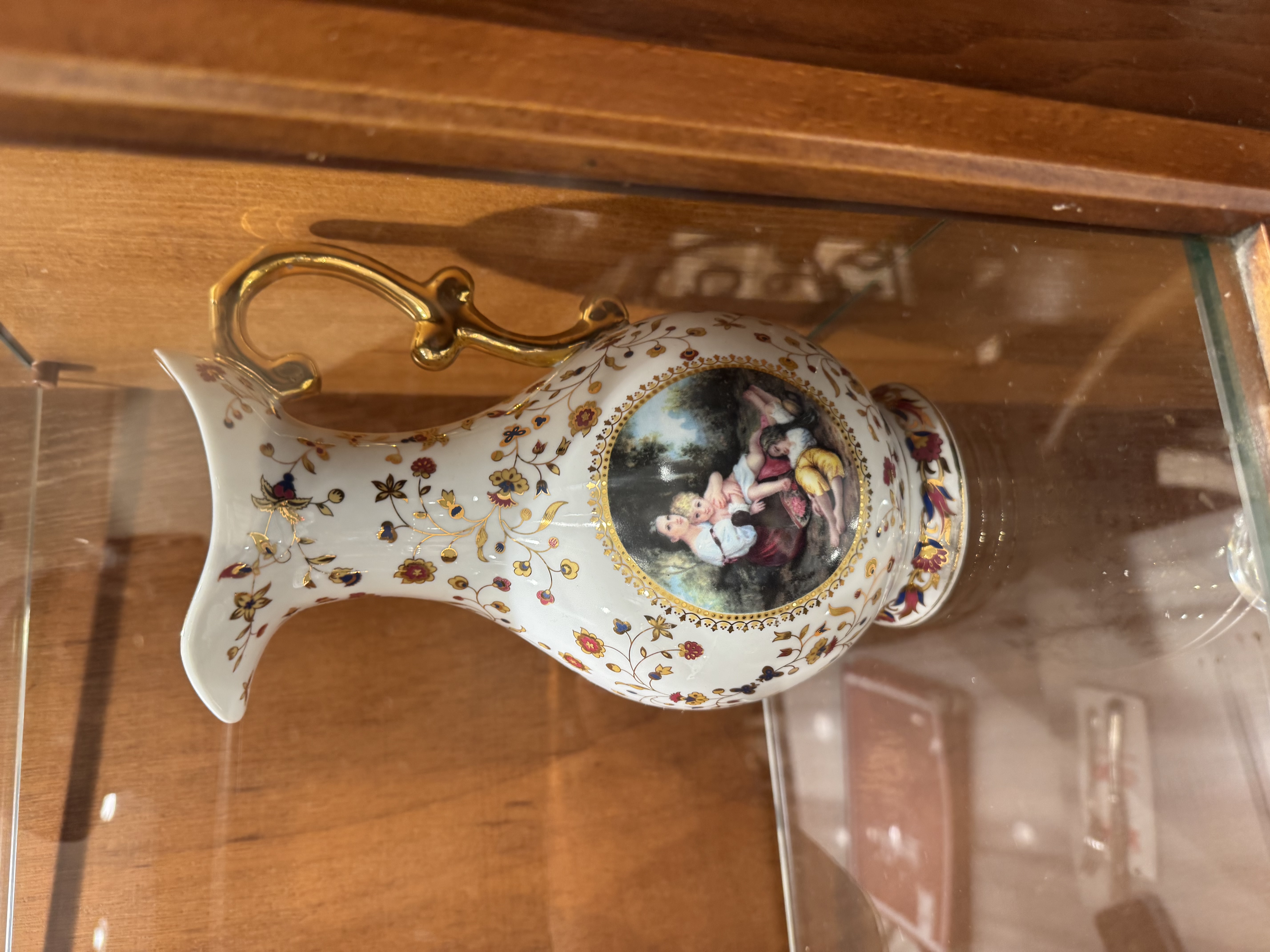 Austrian Royal Vienna Style Porcelain Ewer with Gilt Floral Sprigs and Pastoral Reserve