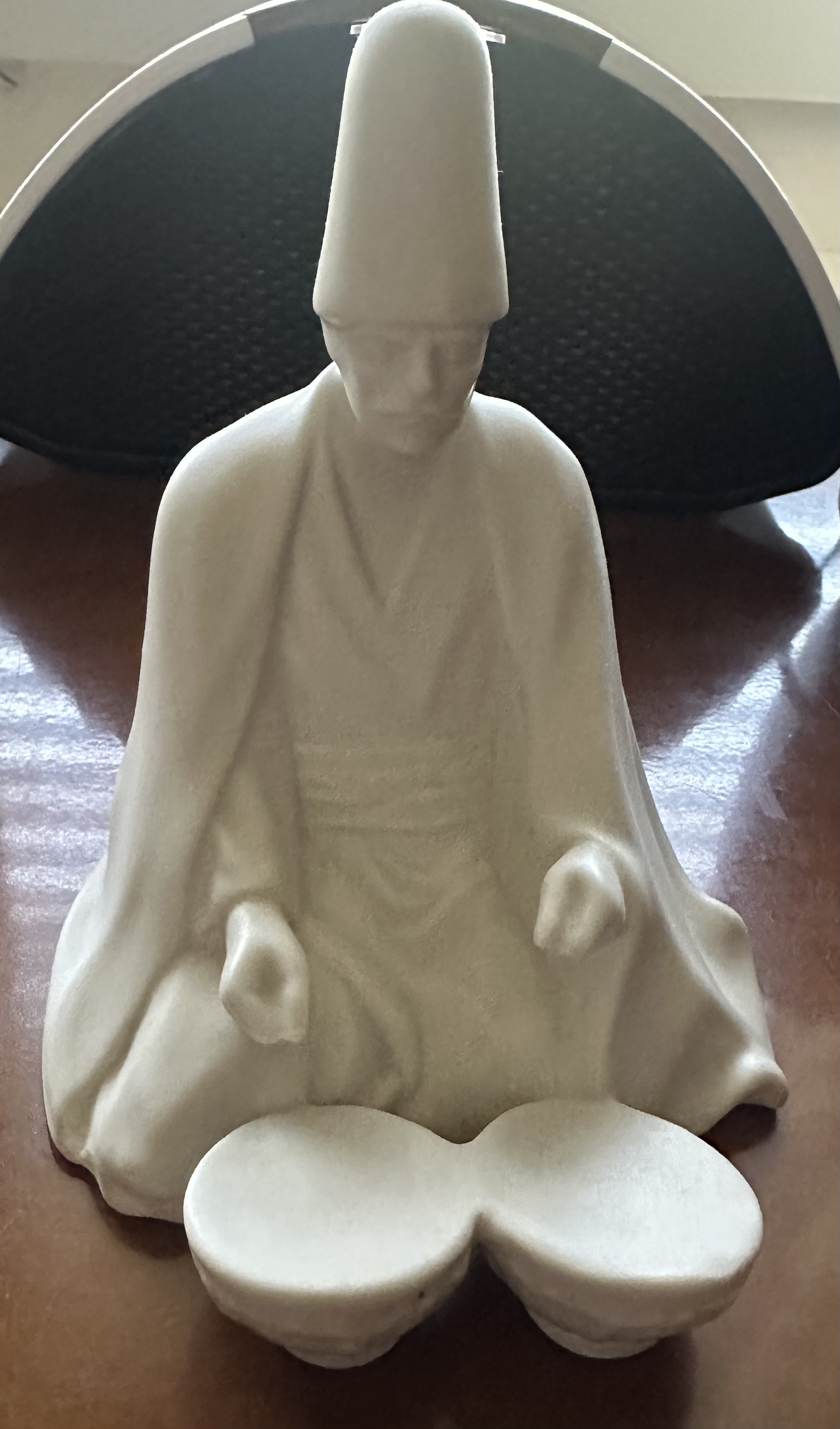 Contemporary White Ceramic Sculpture of a Meditating Figure