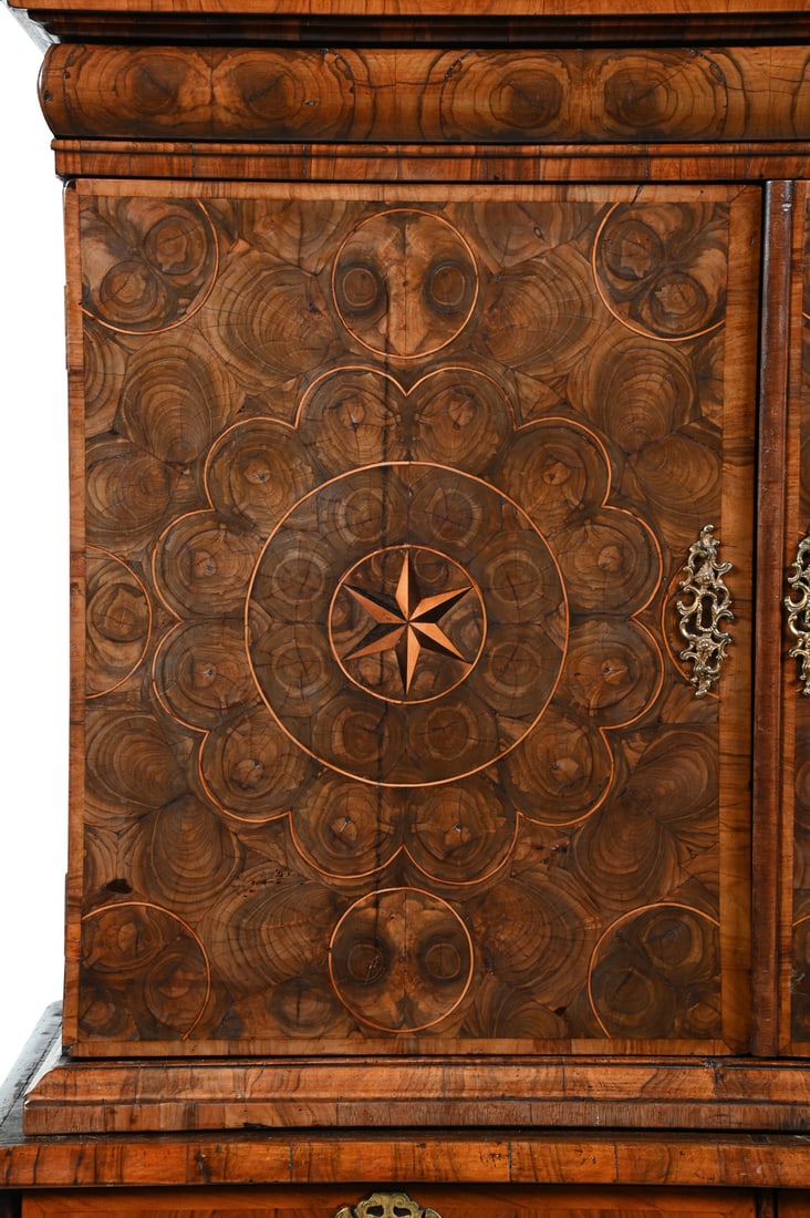 A WILLIAM & MARY WALNUT OYSTER VENEER CABINET ON CHEST, CIRCA 1690 and later thumbnail 5