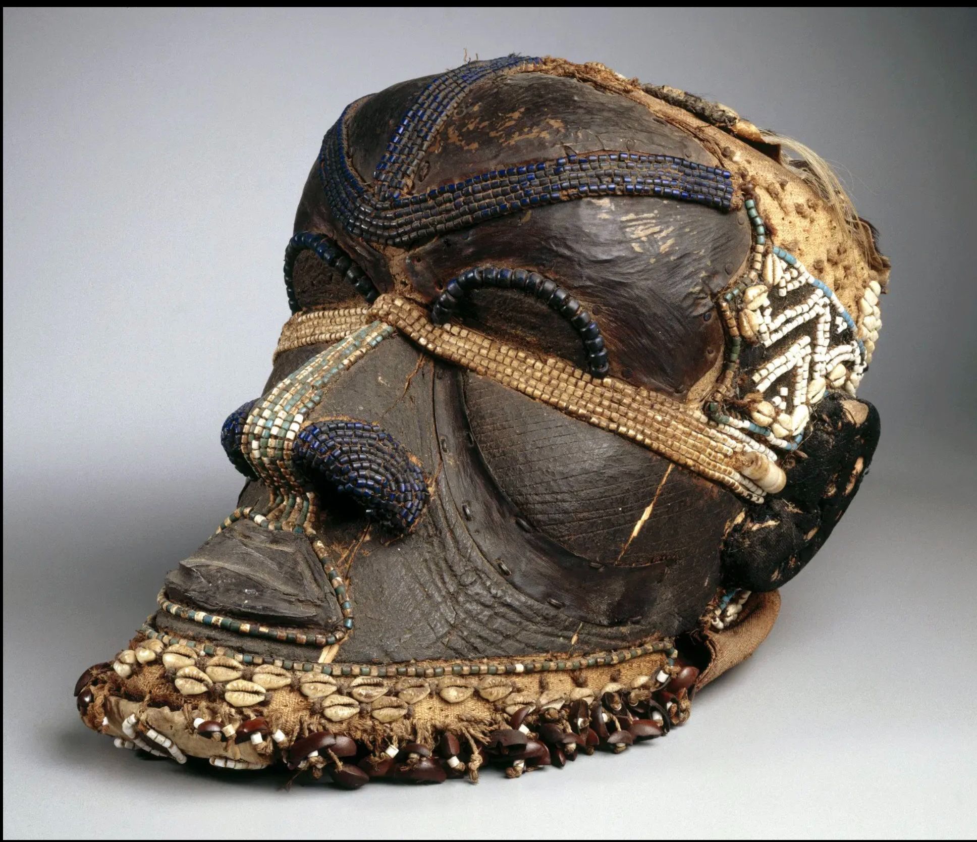 Chokwe/Lwena Period Wood and Bead Mwana Pwo Mask thumbnail
