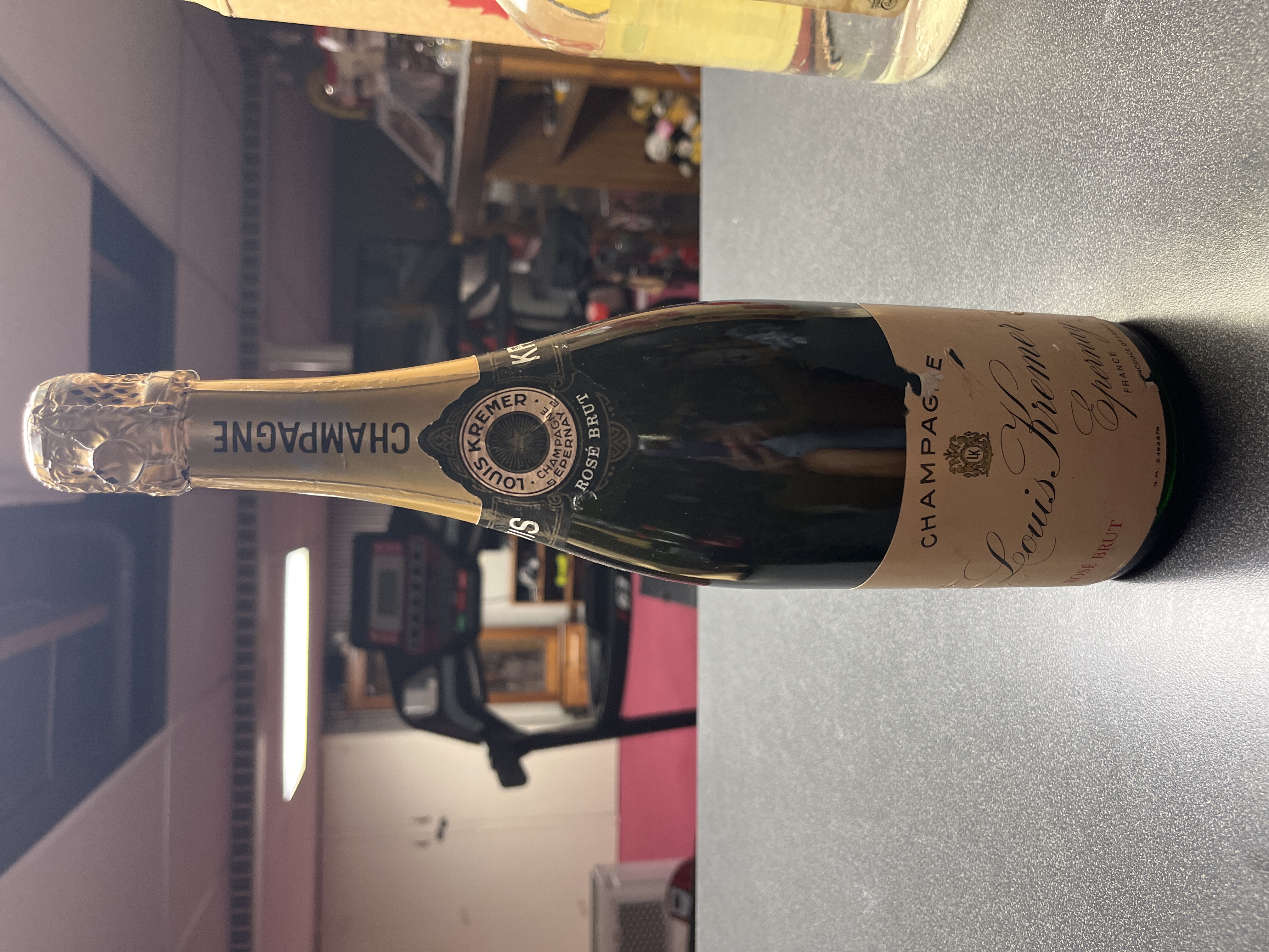 French Louis Kremer Rosé Brut Champagne Bottle