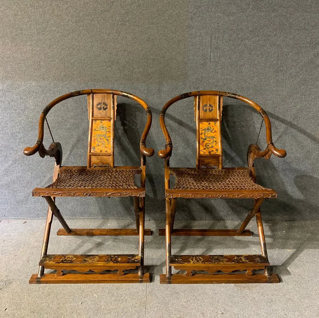 Pair of Chinese Qing Dynasty Huanghuali Horseshoe-Back Folding Armchairs